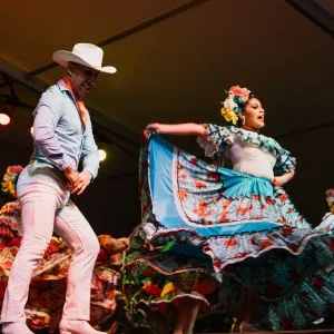 Dancers performing at a Cinco de Mayo fiesta, representing cultural fun things to do in Oregon