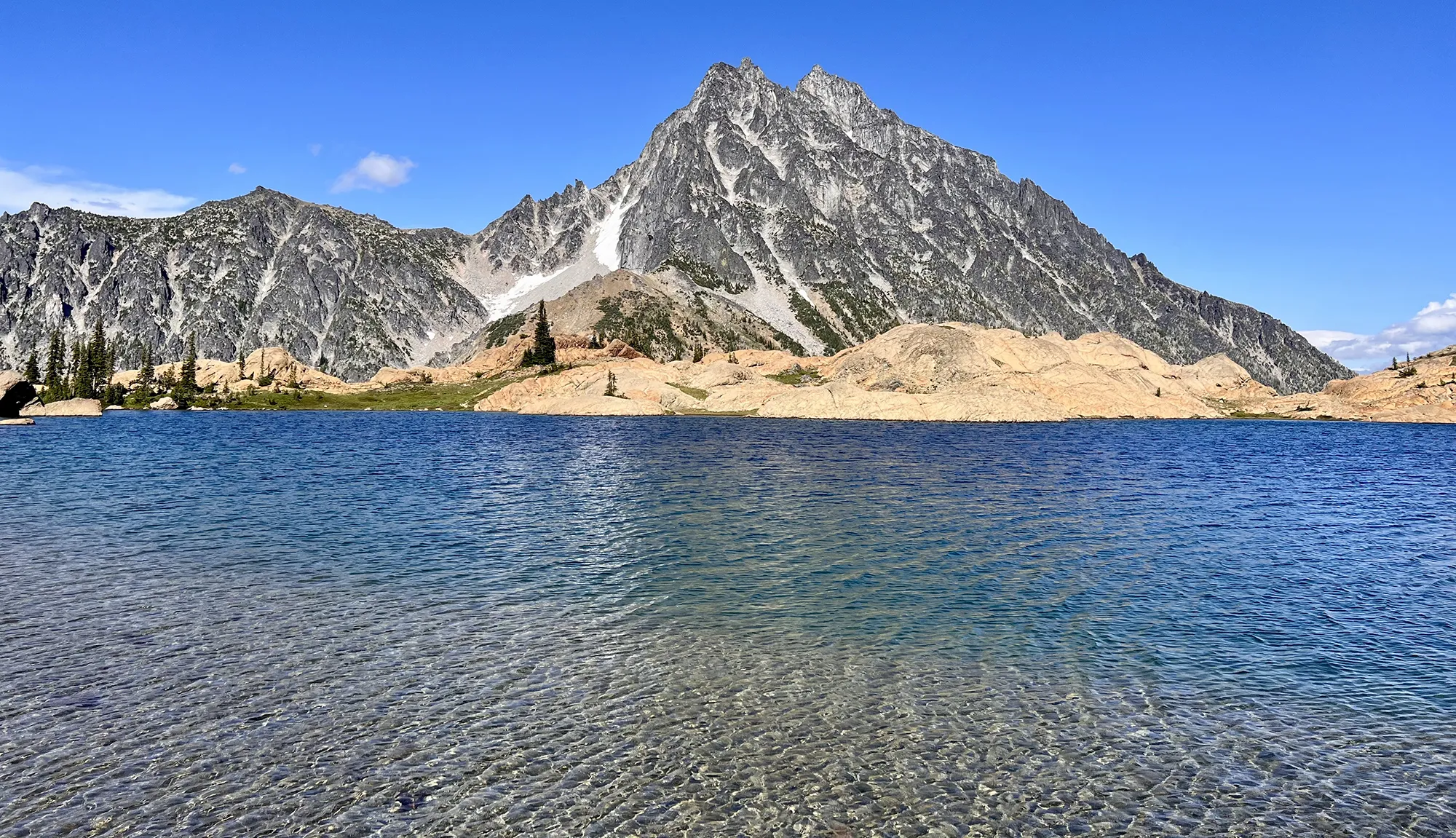 Deep blue Lake Ingalls with Mount Stuart in the background