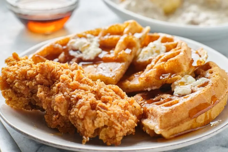 Delicious chicken and waffles, a popular comfort food dish to eat in Arlington TX