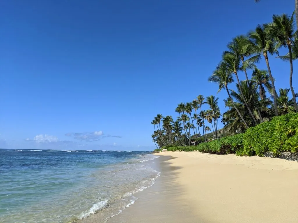 Diamond Head Beach Park, one of the scenic Best Beach In Honolulu locations with a volcanic backdrop