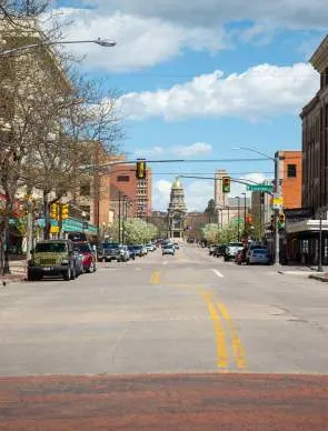Downtown Cheyenne, Wyoming, featuring historic buildings and the Wyoming State Capitol.
