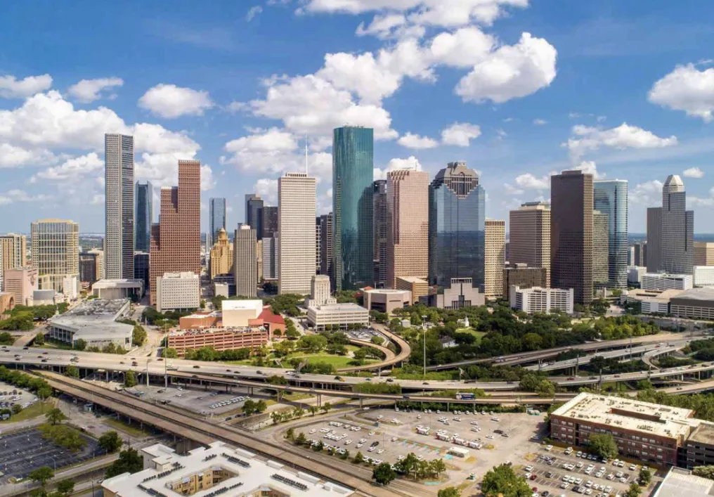 Downtown Houston, Texas skyline reflecting the city's humid subtropical climate and bayou system.