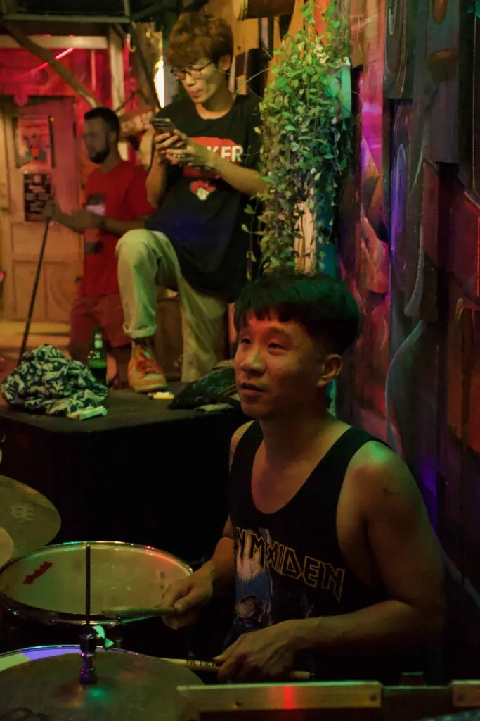 Drummer performing at The Trip 66 open mic night