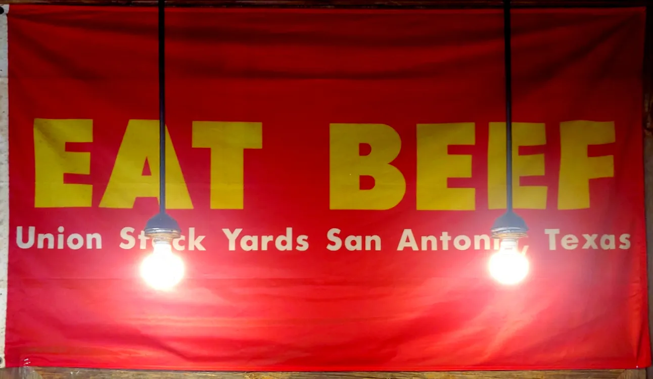 Eat Beef. Union Stock Yards San Antonio sign, an interesting piece of decor at Smoke Shack BBQ related to Texas beef culture, relevant to what to eat in san antonio texas