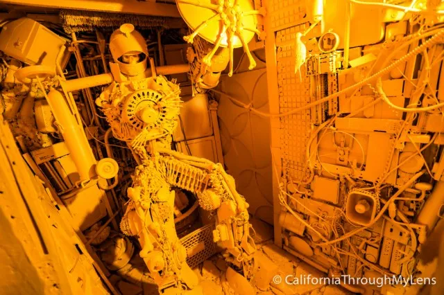 Elaborate and colorful Christmas light display featuring robot figures