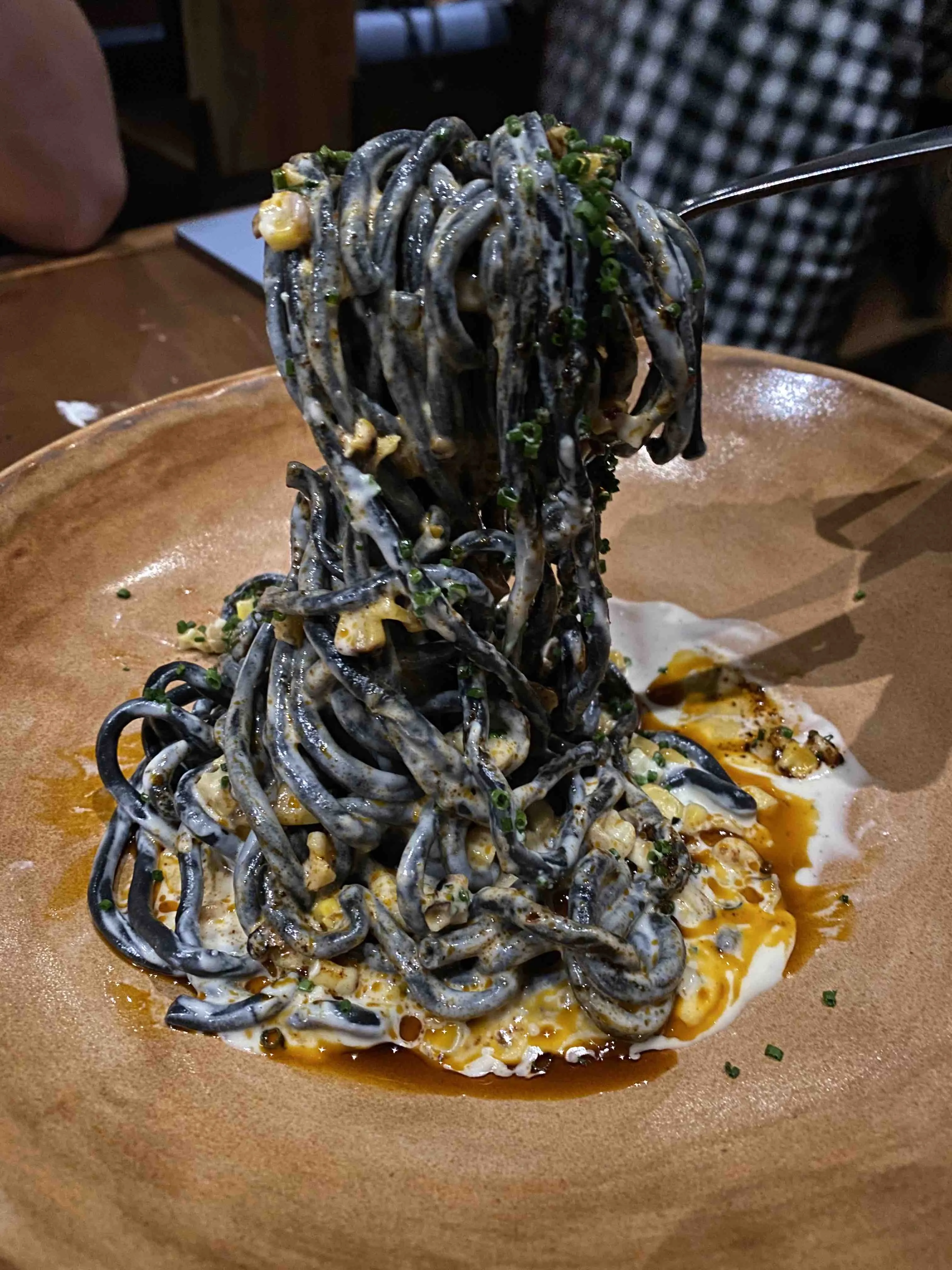 Elegant plate of pasta and other dishes from Intero Restaurant in Austin