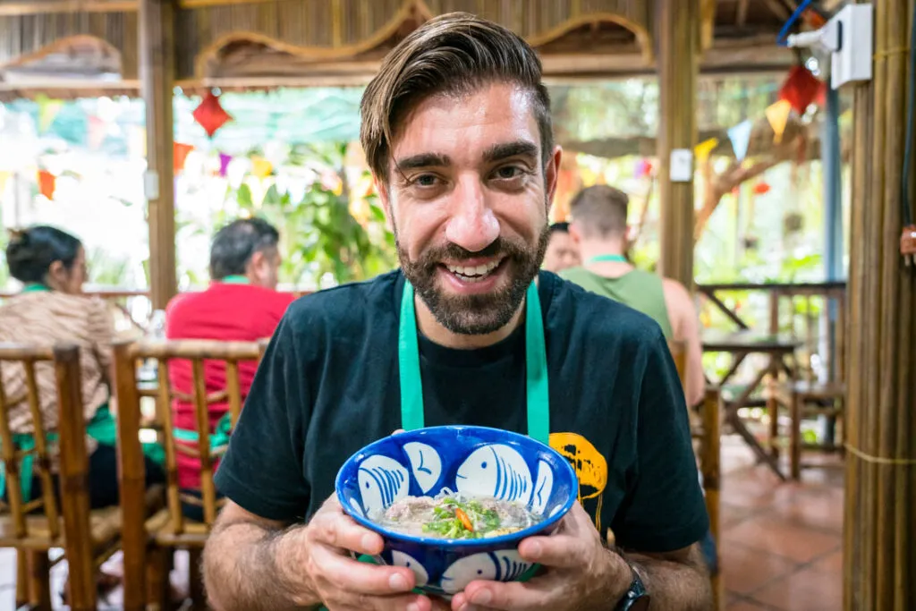 Enjoying a bowl of freshly made Pho after a Hoi An Cooking Tour