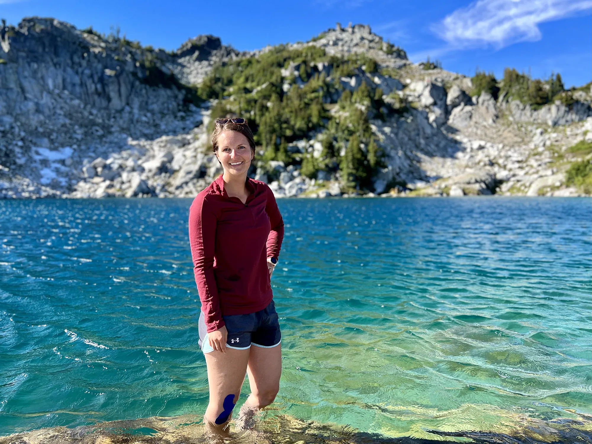 Enjoying a dip in Thunder Mountain Lake after a long hike, Washington