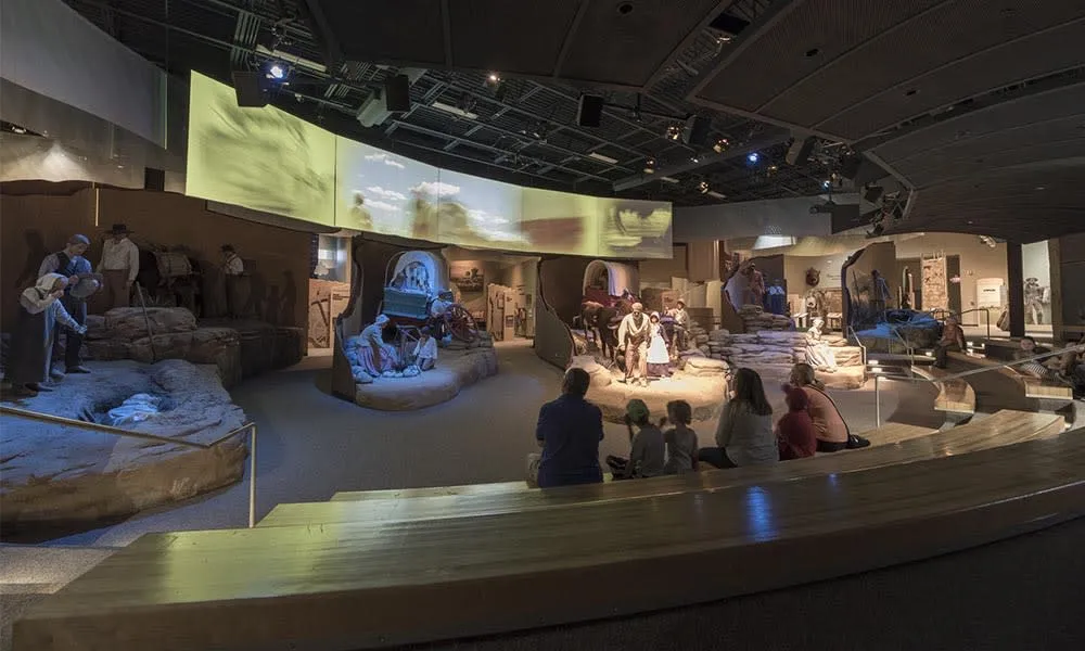 Exhibits depicting pioneer life and covered wagons at the National Historic Trails Interpretive Center - History Things To See And Do In Wyoming