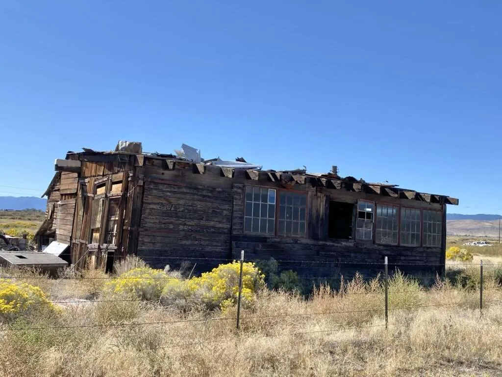 Exterior of small abandoned shack