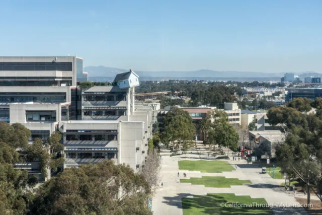Fallen Star house art installation perched on the edge of a building at UCSD