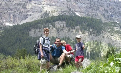 Family enjoying whitewater rafting