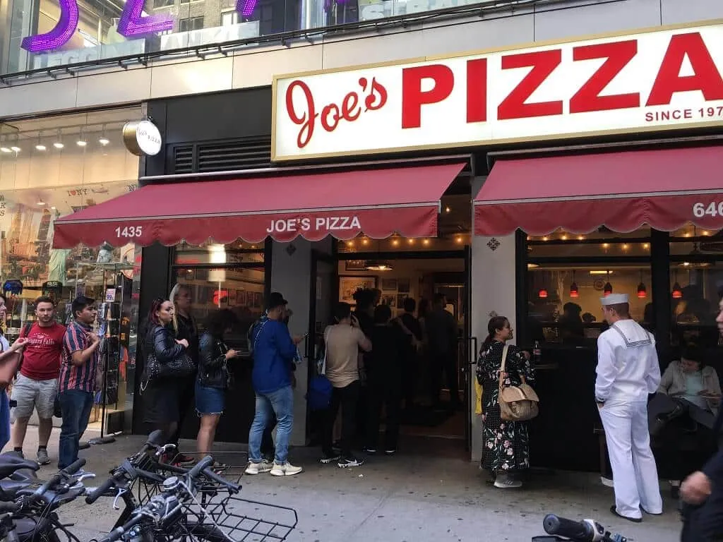 Front view of the famous Joe's Pizza in Greenwich Village, NYC