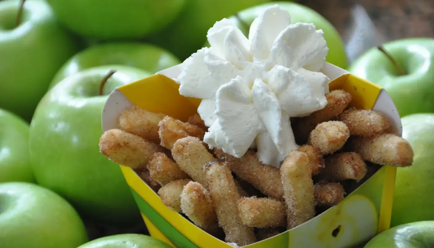 Granny's Apple Fries served with a side of vanilla cream dipping sauce.