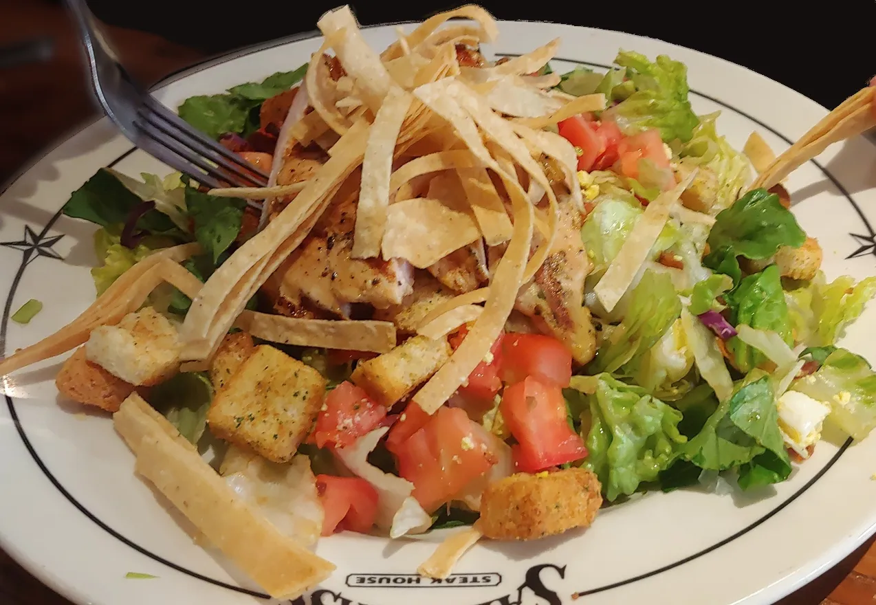 Grilled Chicken Salad at Saltgrass, a refreshing option among what to eat in san antonio texas
