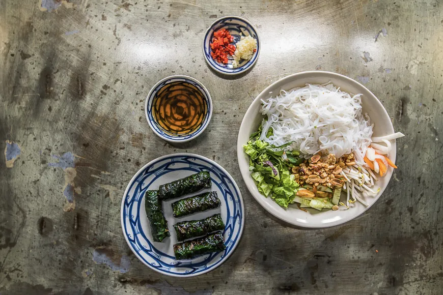 Grilled minced beef wrapped in betel leaves, Bo La Lot, a Southern Vietnamese specialty