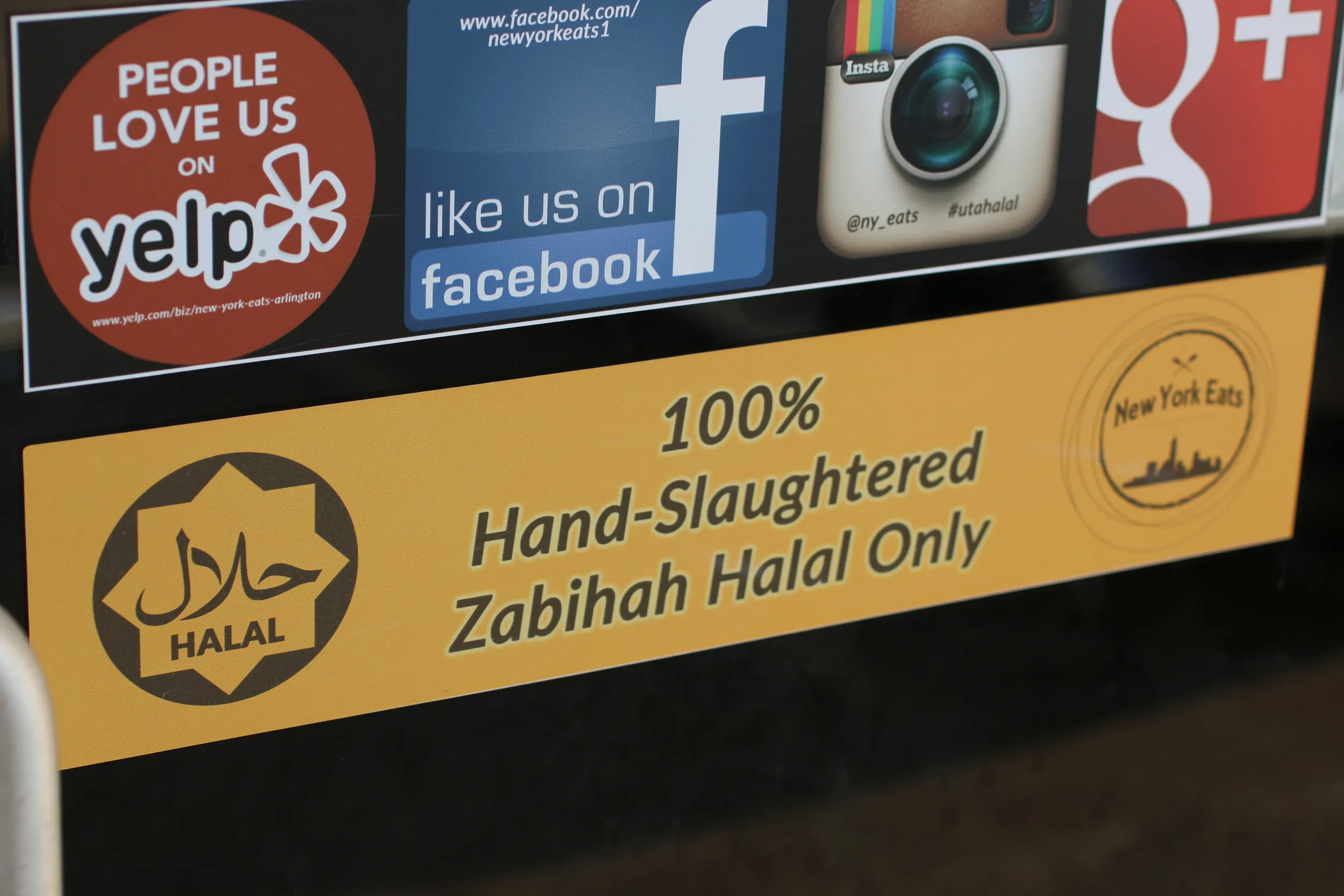 Halal certified food sign on a New York street cart