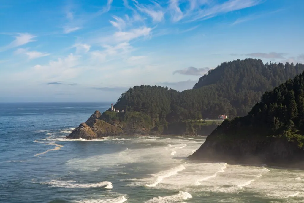Heceta Head Lighthouse standing against the cliffs