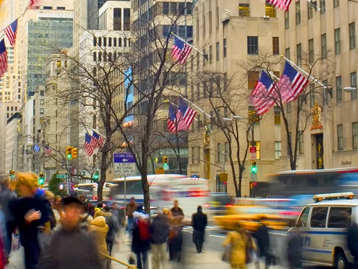 High-end retail stores lining Fifth Avenue in Midtown Manhattan, New York.