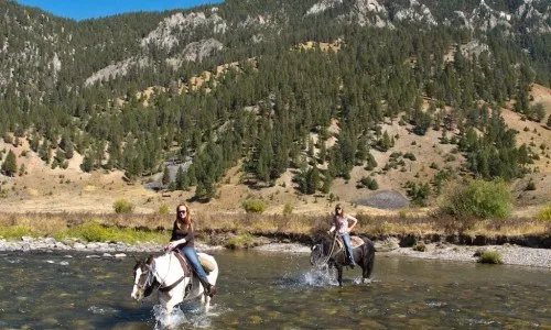 Hikers enjoy mountain views on a trip to Montana