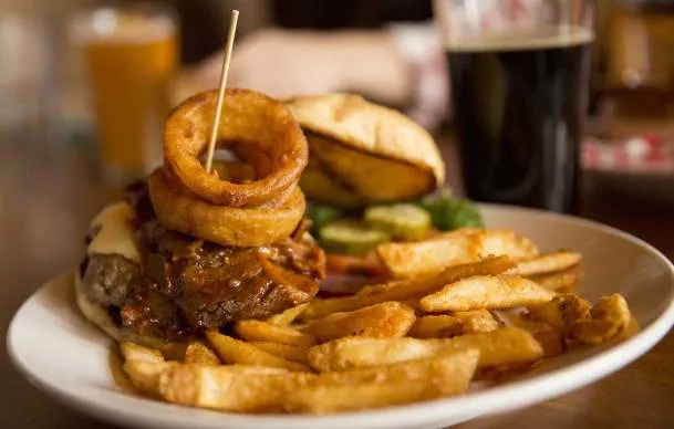 Image showcasing various Wyoming dishes and drinks, highlighting the food scene