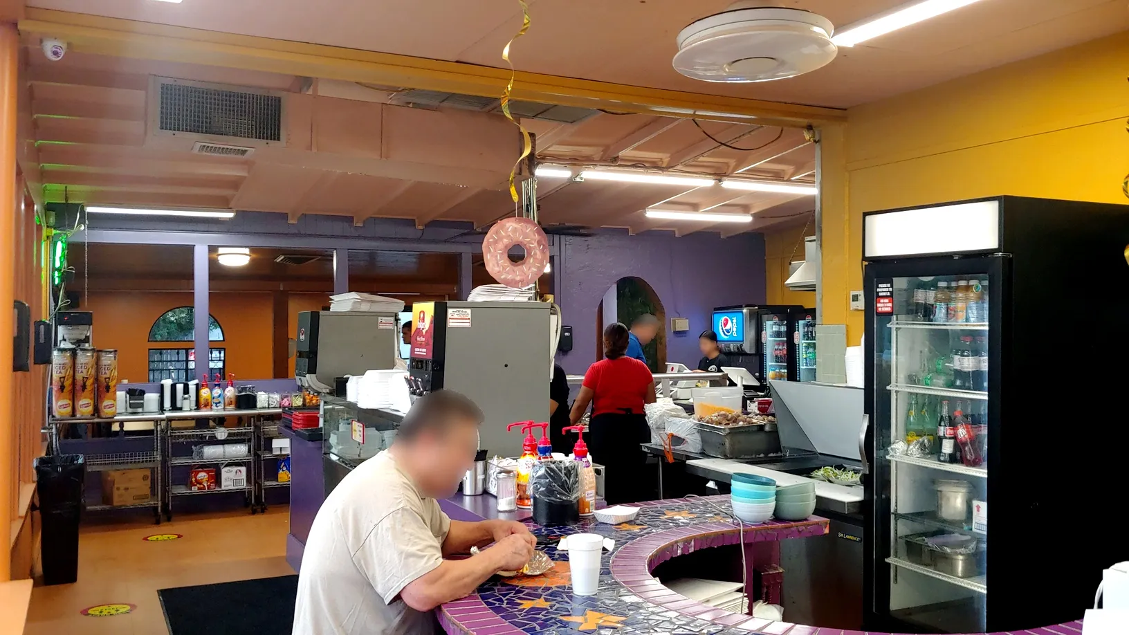 Inside view of the Original Donut Shop dining area