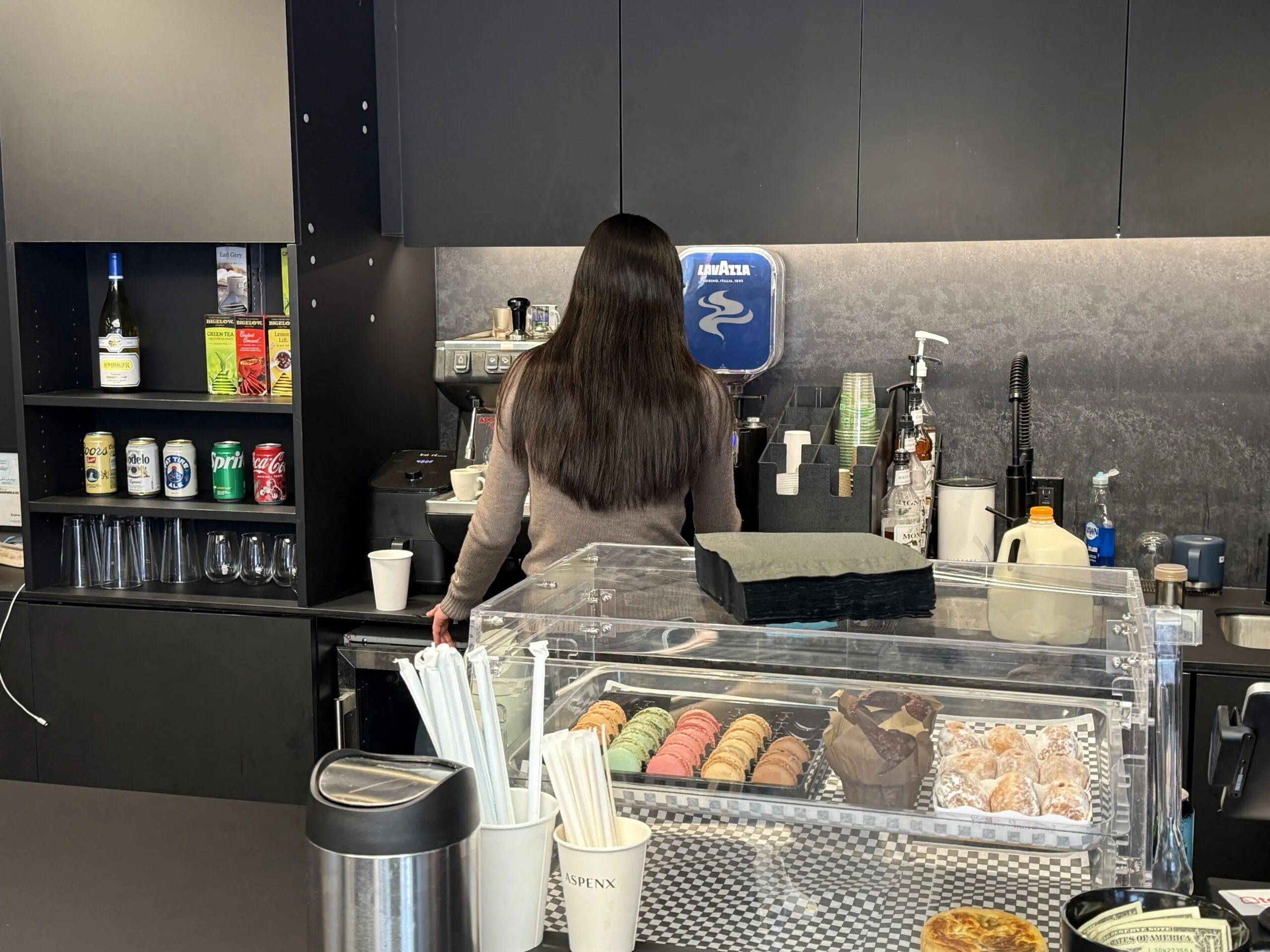 Interior display of pastries and coffee at Aspen Collection Café