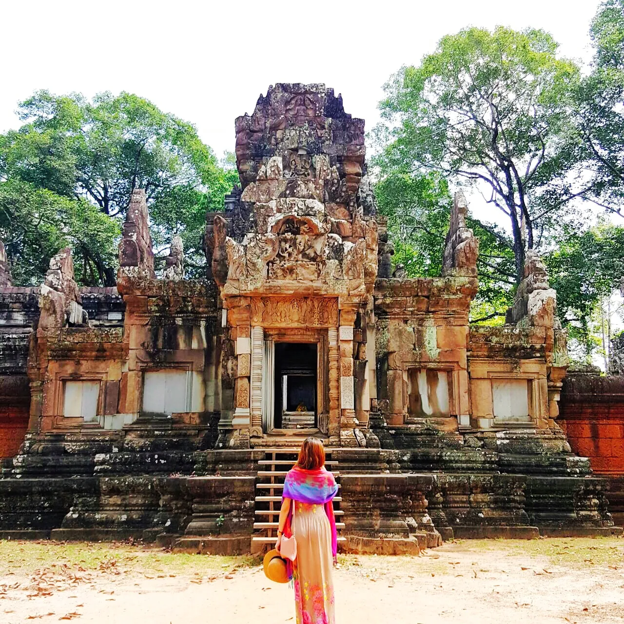 Intricate carvings on an ancient temple wall in Siem Reap, Cambodia