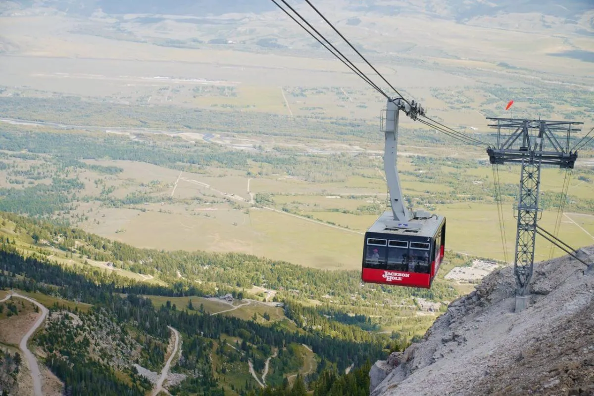 Jackson Hole Aerial Tram ascending Rendezvous Mountain with valley view below