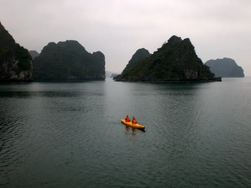 Kayaking among limestone karsts in Ha Long Bay