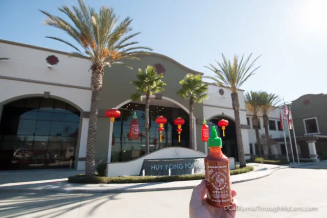 Large machinery and production lines inside the Sriracha factory