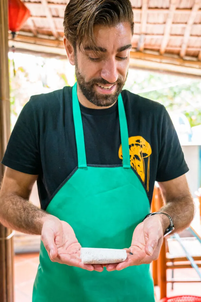 Learning to make crispy spring rolls on a Hoi An Cooking Tour