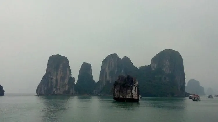 Majestic limestone karsts dot the waters of Ha Long Bay, offering breathtaking views
