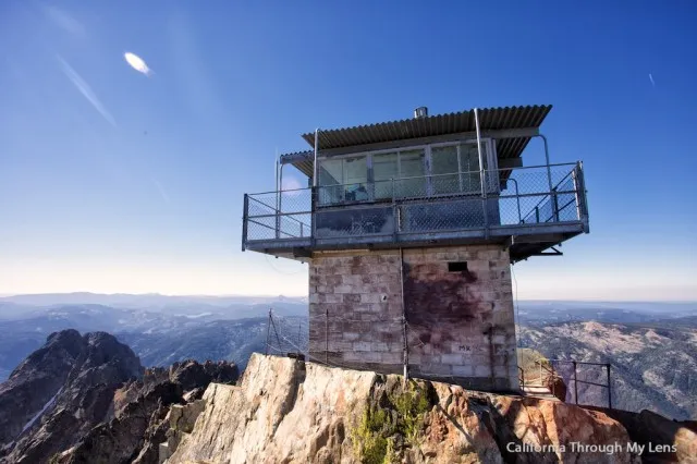 Metal stairs lead up to the historic Sierra Buttes Fire Lookout with panoramic mountain views