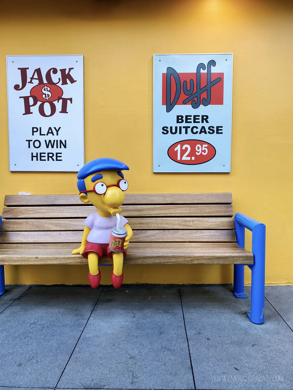 Your Ultimate Guide to Oktoberfest Los Angeles 2024 Milton of Simpsons sitting on a bench at Universal Studios, a must visit during your 4 day Los Angeles itinerary