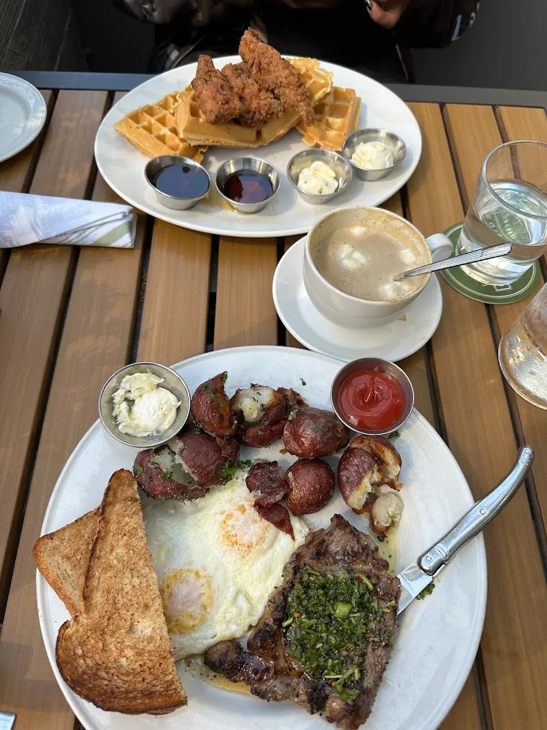 Modern and inviting interior at Caroline restaurant, a contender for best breakfast in Austin