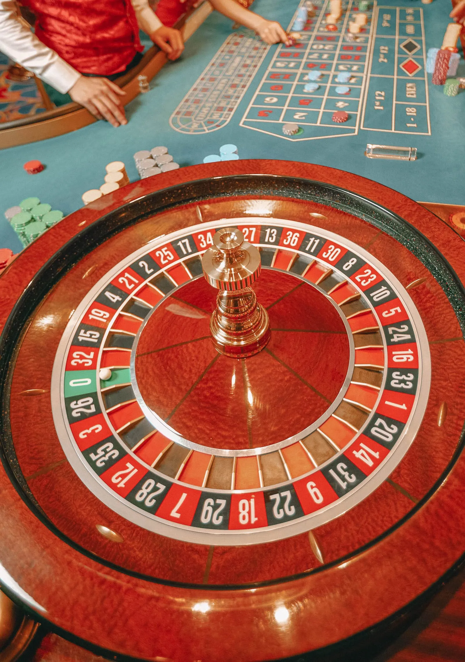 More gamblers trying their luck at slot machines in a brightly lit Las Vegas casino