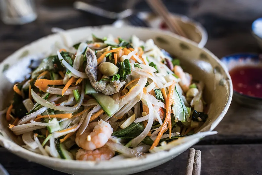 Nom Hoa Chuoi, Vietnamese banana flower salad with vegetables, herbs, and peanuts