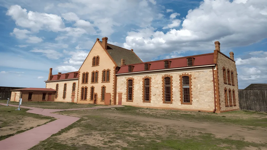 Outside view of the historic Wyoming Territorial Prison in Laramie - Things To See And Do In Wyoming History