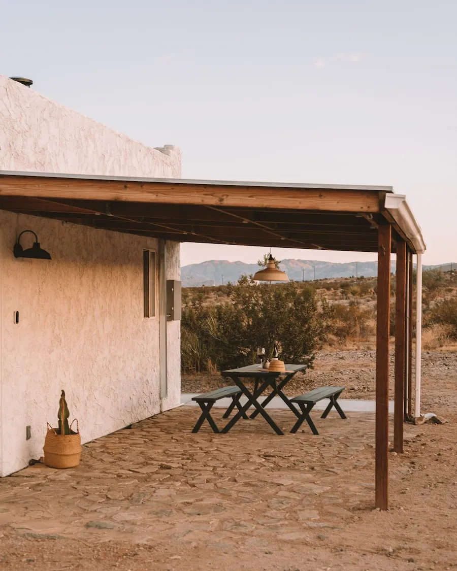 Patio of El Rancho restaurant in Joshua Tree with retro sign