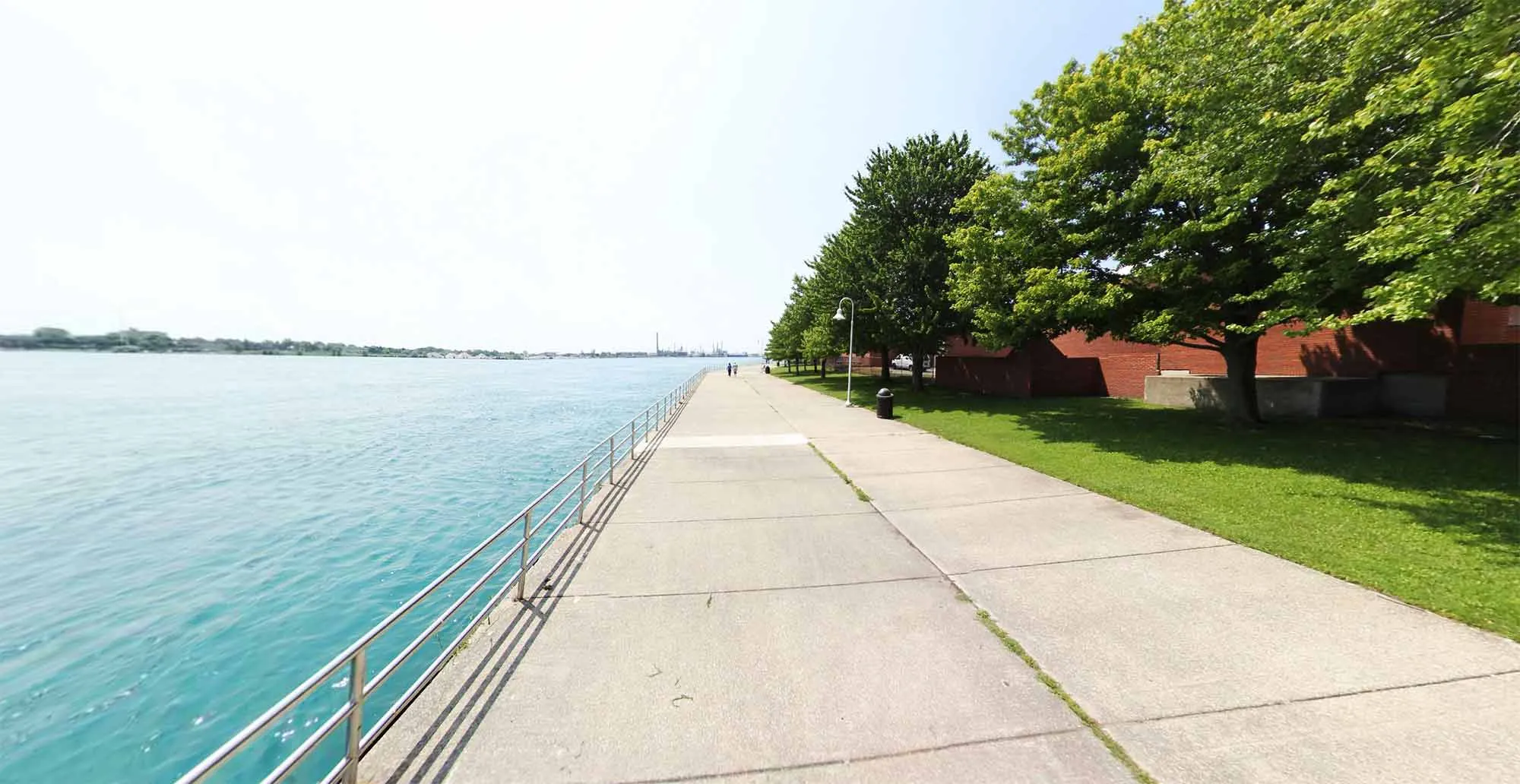 Paved pathway along the St. Clair River, part of the Blue Water River Walk trail system
