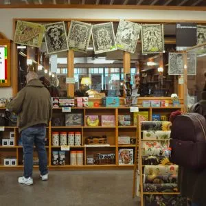 People browsing books at Powell's City of Books, a must-visit bookstore for fun things to do in Portland