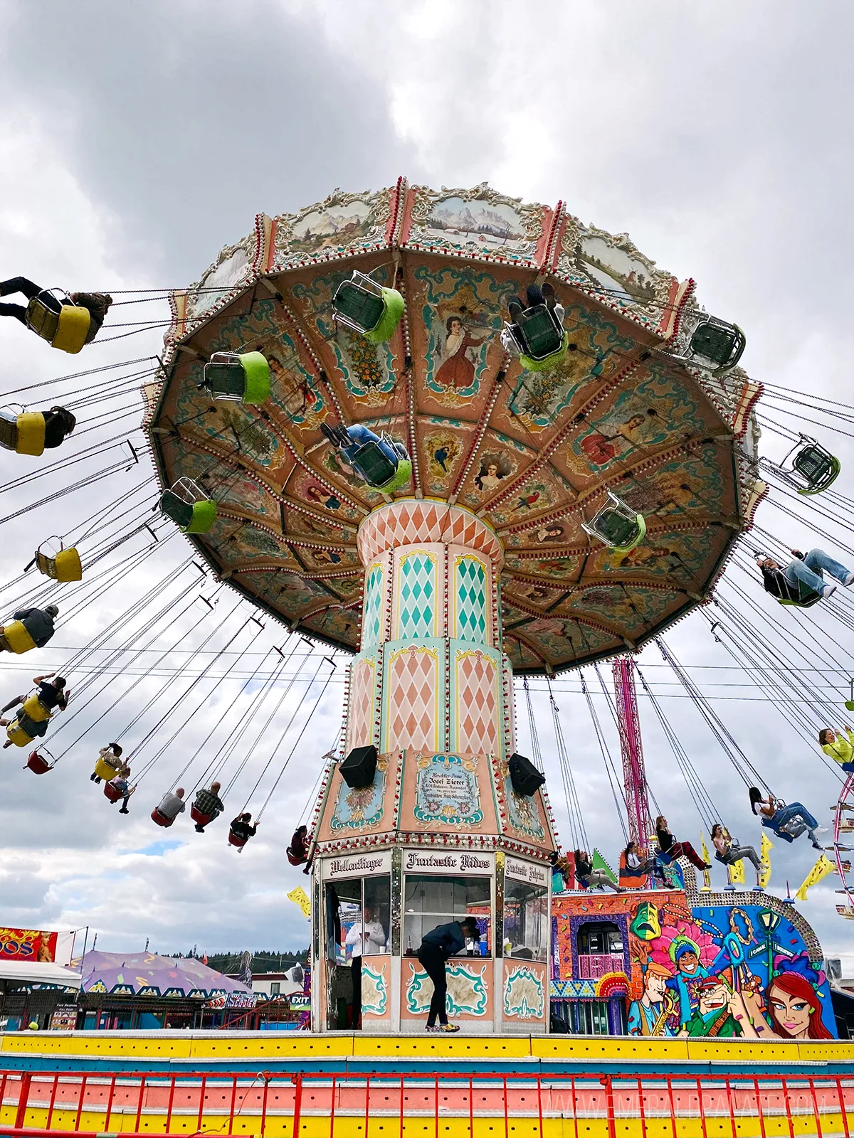 People riding swings at the Washington State Fair