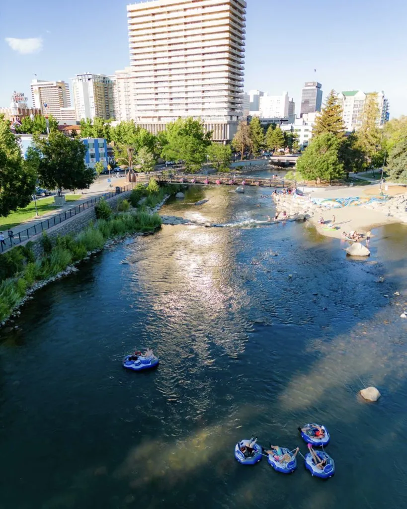People tubing down the Truckee River in downtown Reno