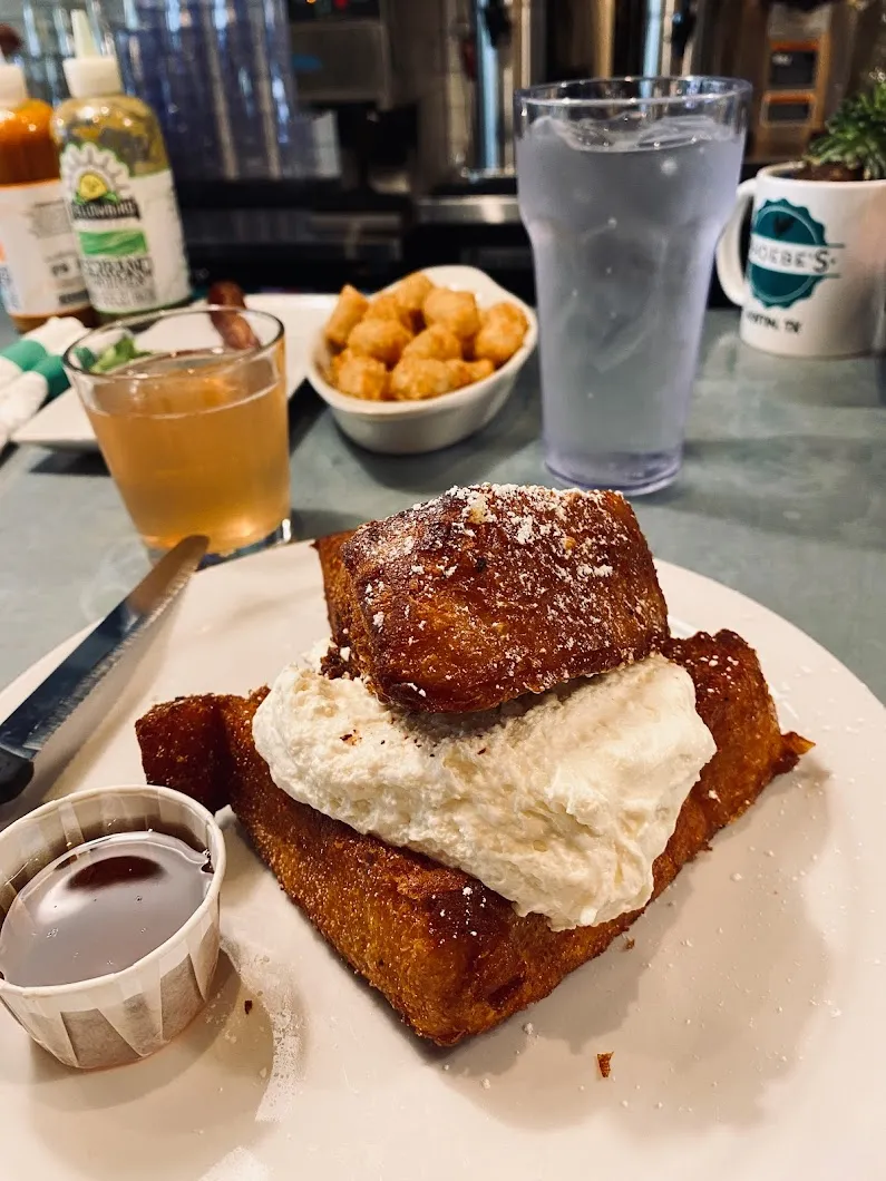 Popular Fried Chicken and Grits from Phoebe's Downtown, a top spot for best breakfast in Austin