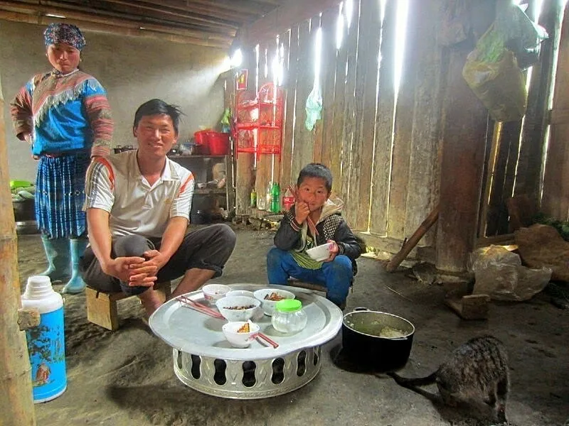 Portrait of a woman from the beautiful Flower Hmong minority in Sapa Valley, interacting with local communities is a key experience