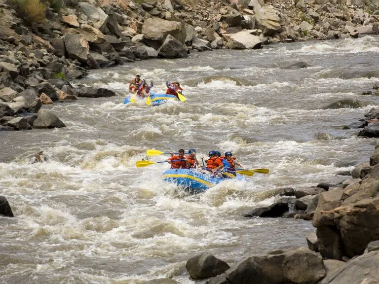 Rafters on Arkansas River in Colorado, an adventurous activity for honeymoon destinations.