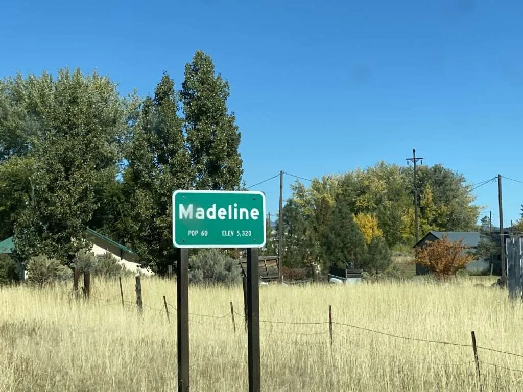 Railroad tracks and buildings in Madeline, California ghost town area