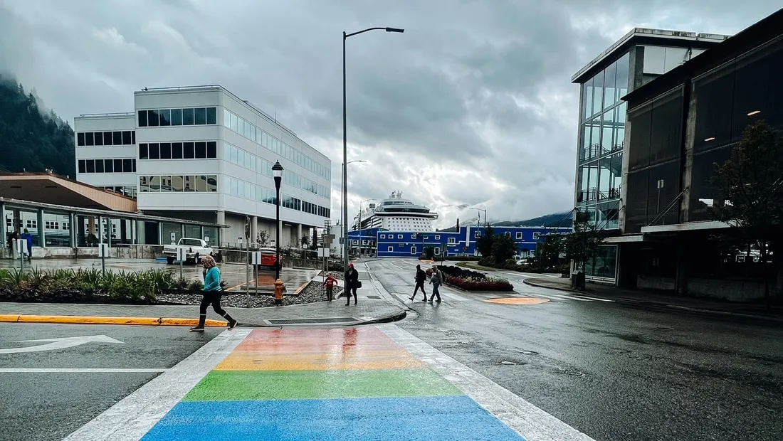 Rainbow painted crosswalk at an intersection in downtown Juneau