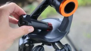 Red flashlight accessory that slots into the tripod of the Celestron Inspire 100AZ amateur telescope